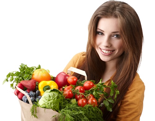 woman-holding-bag-of-fruit-veg
